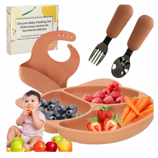 Silikona trauku un piederumu komplekts bērnam, oranžā krāsā. Attēlā redzams komplekts.